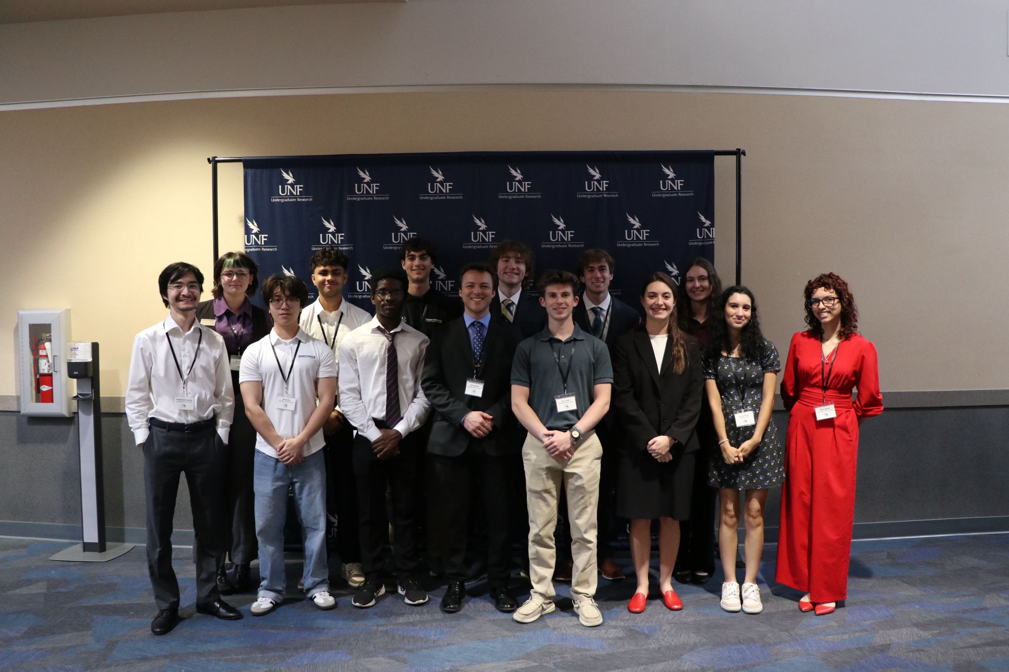 ERAU students and faculty at FURC, UNF Undergraduate Research backdrop