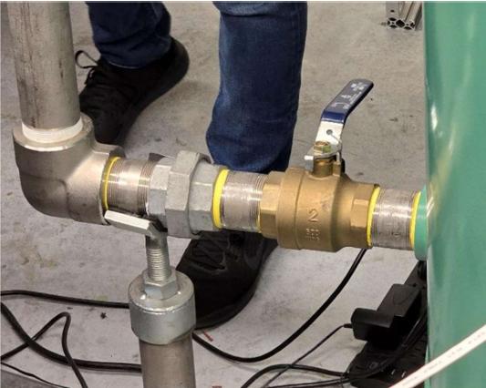 Main ball valve at the base of the air storage tank controlling flow into the wind tunnel