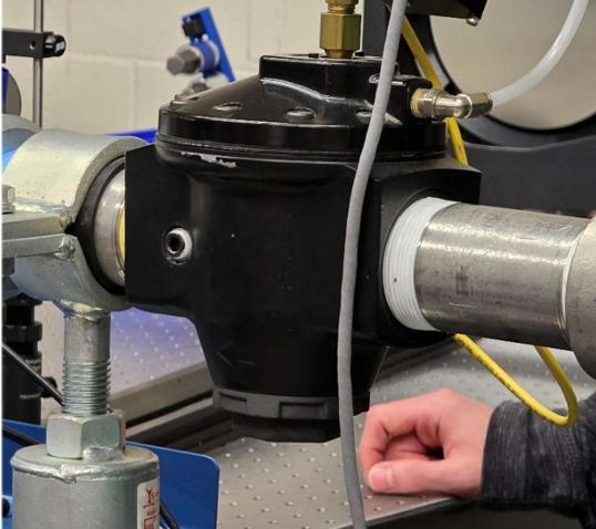 Pressure regulator and nozzle inlet assembly