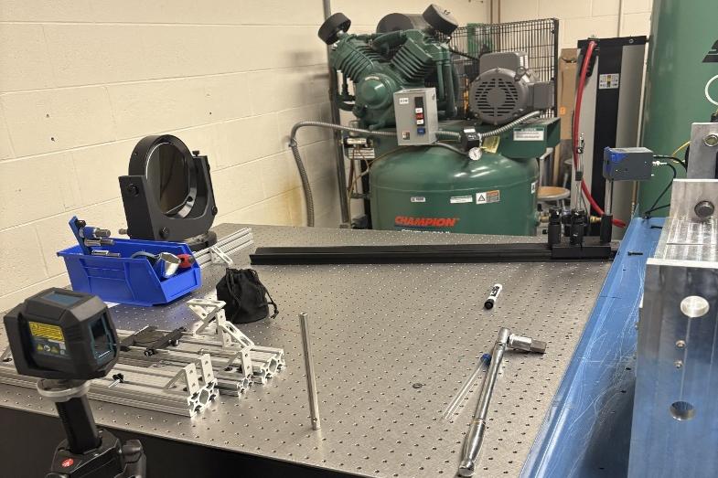 Schlieren imaging setup &ndash; mirror mount, knife edge, and PCO camera aligned on the optical table