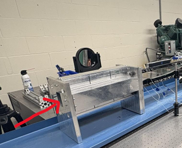 Convergent-divergent nozzle test section with mirror assembly visible