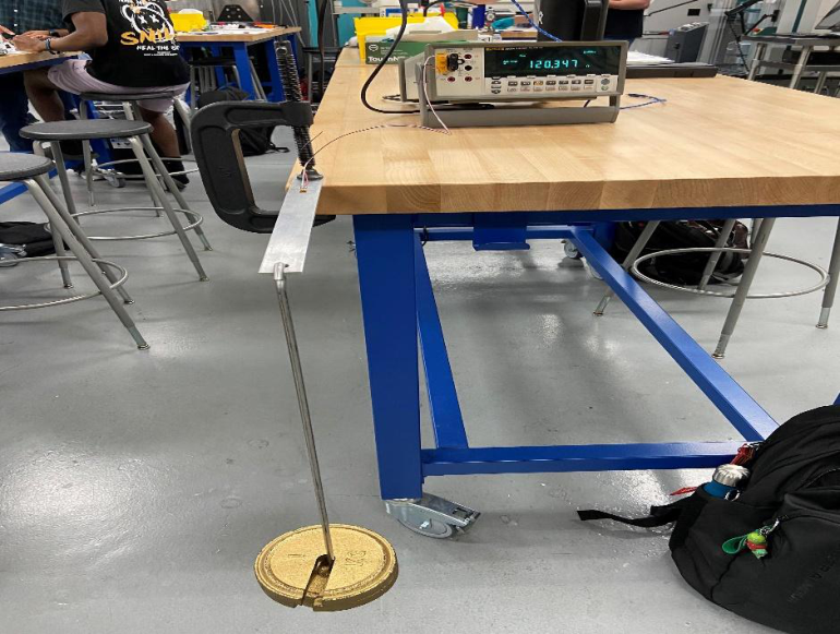 Aluminum beam in tension at maximum applied mass